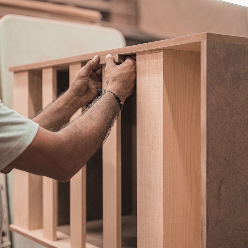 Interior wall showing organized Romex wiring runs and junction boxes